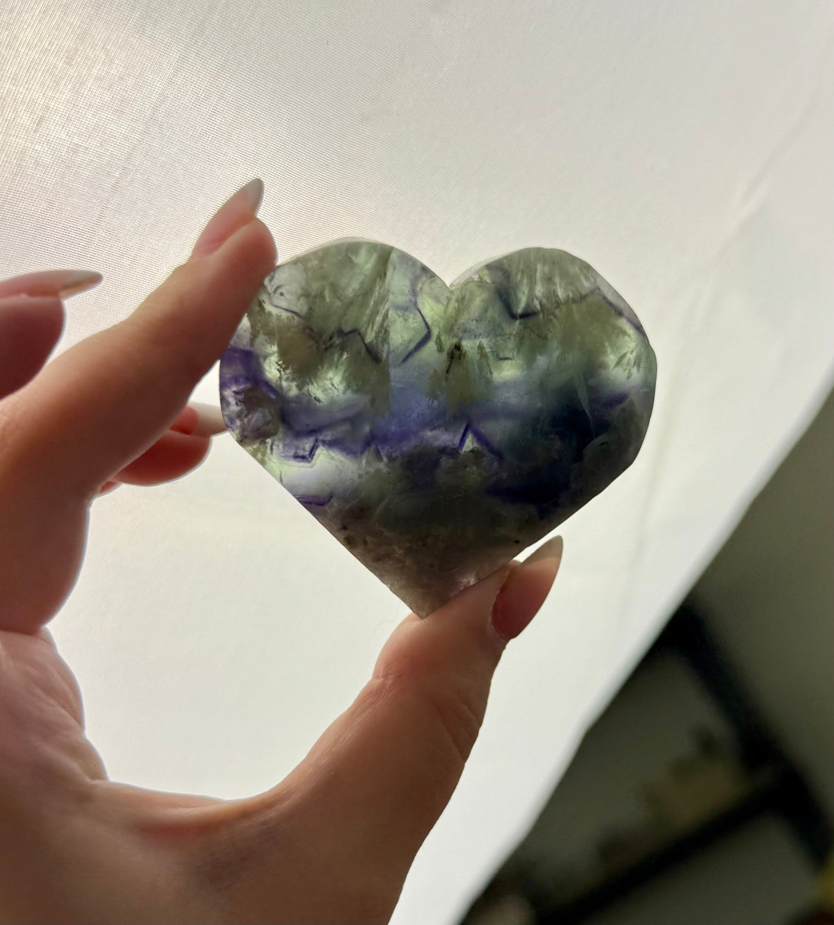Feather fluorite heart carvings