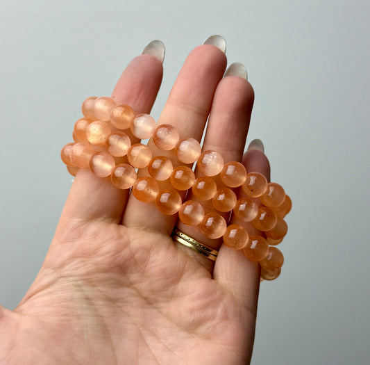 Dyed orange satin spar bracelets