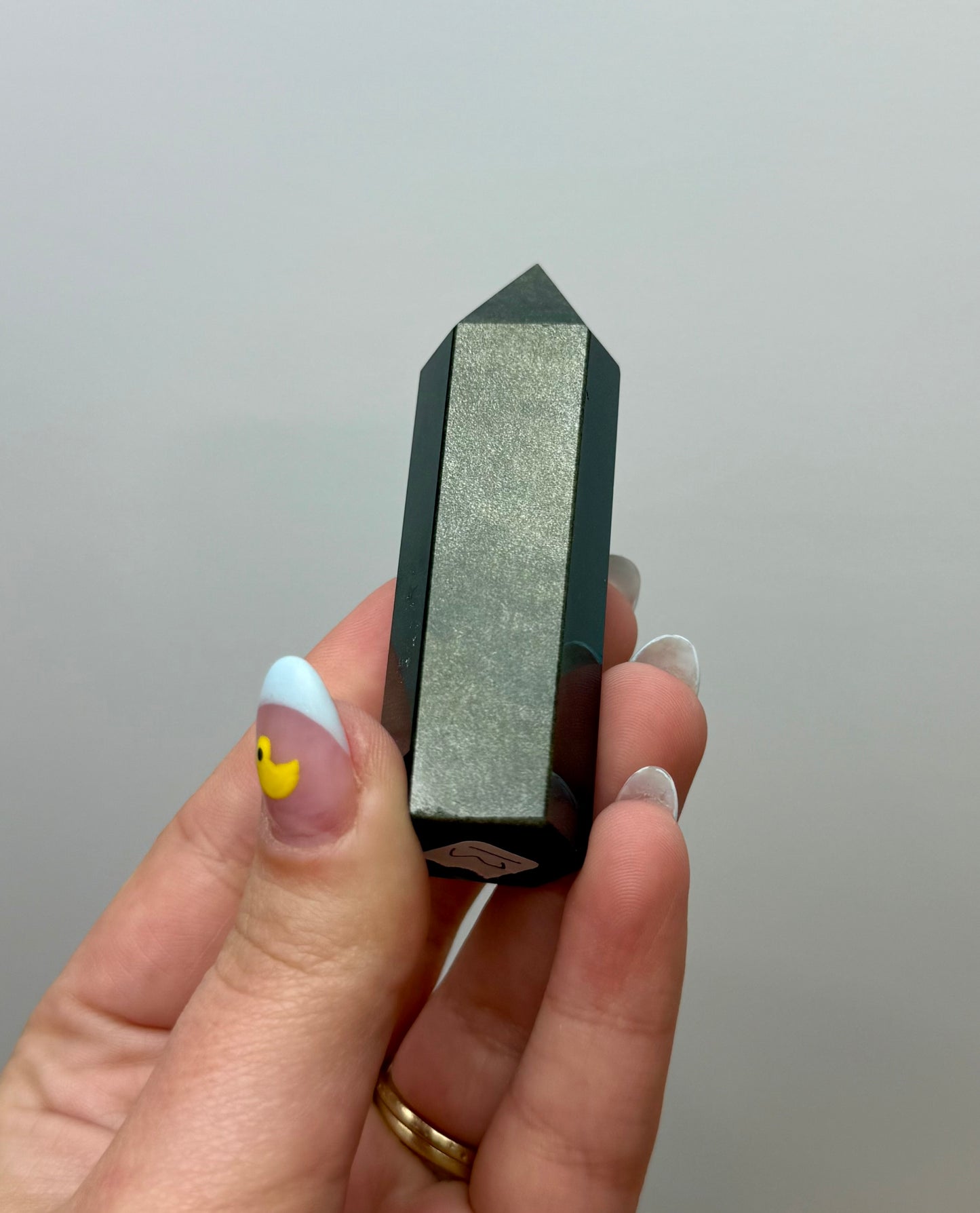 Gold sheen obsidian tower