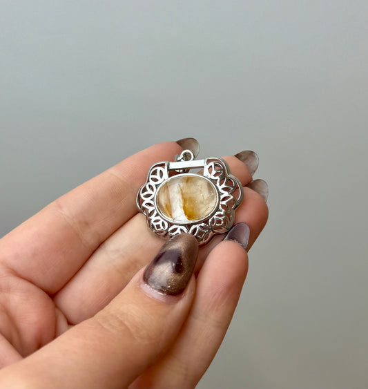 Golden healer pendant
