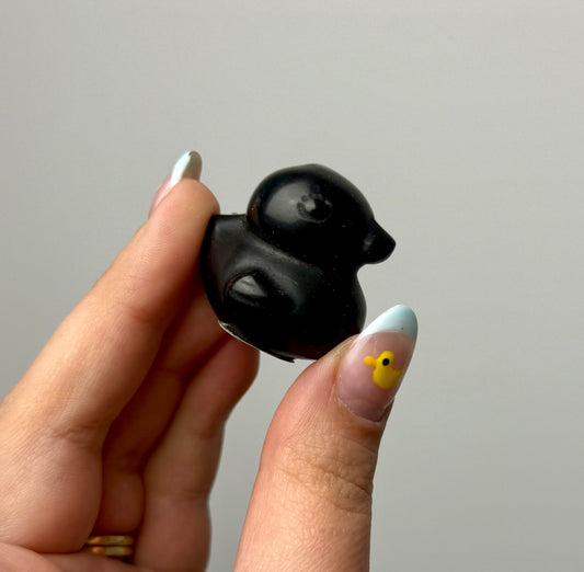 Black obsidian duck carving