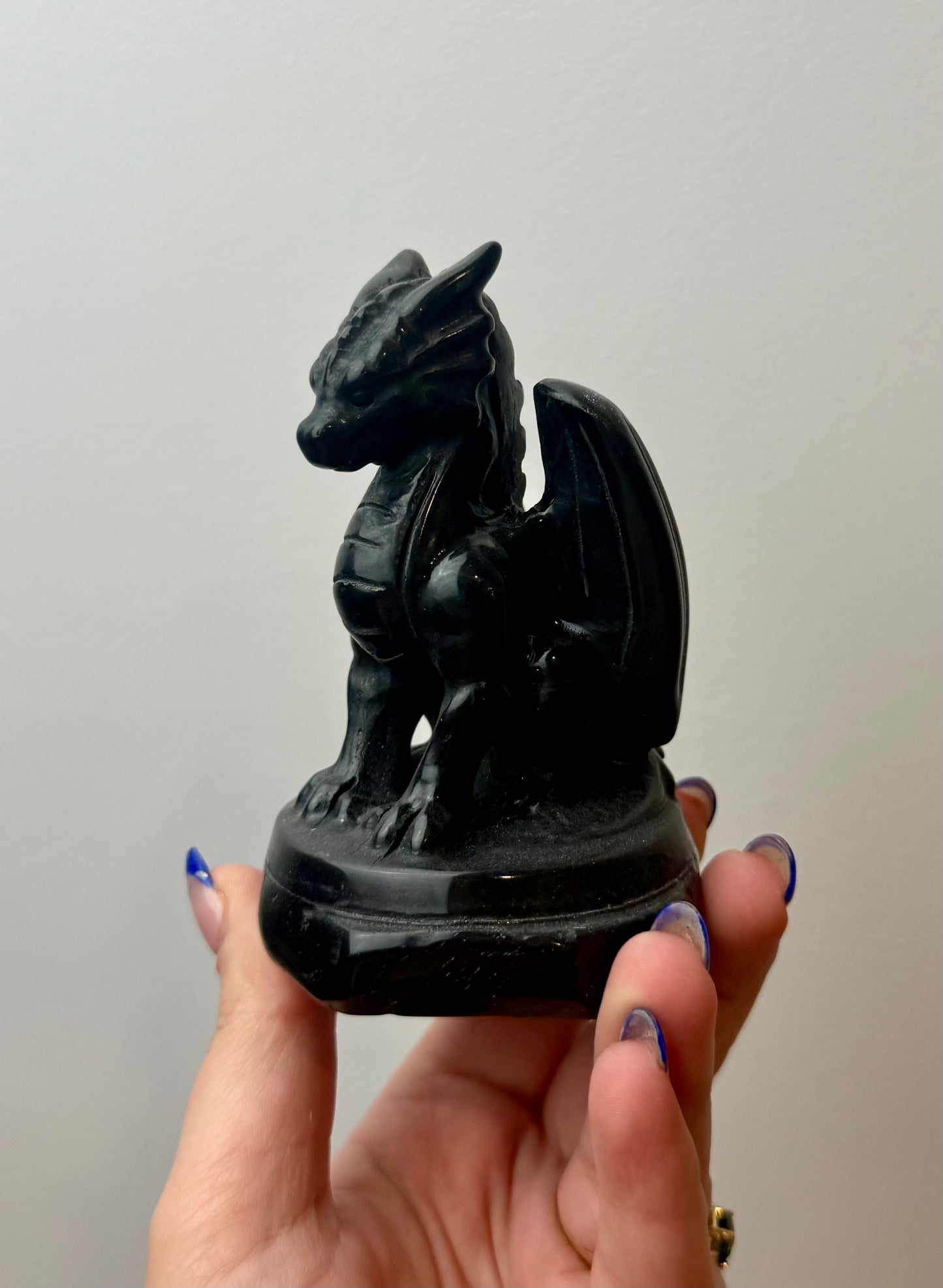 Obsidian dragon carving
