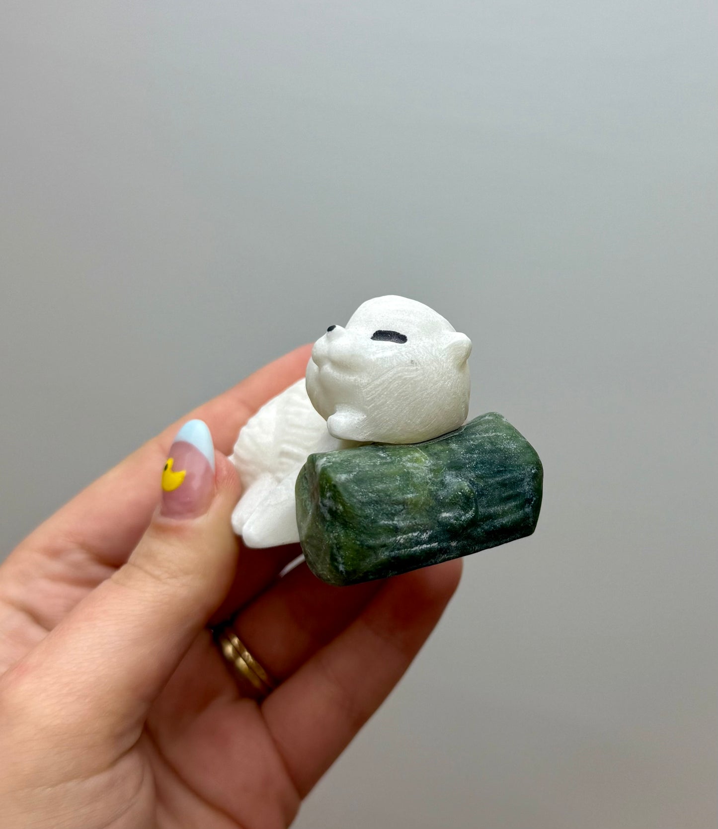 White jade otter carvings