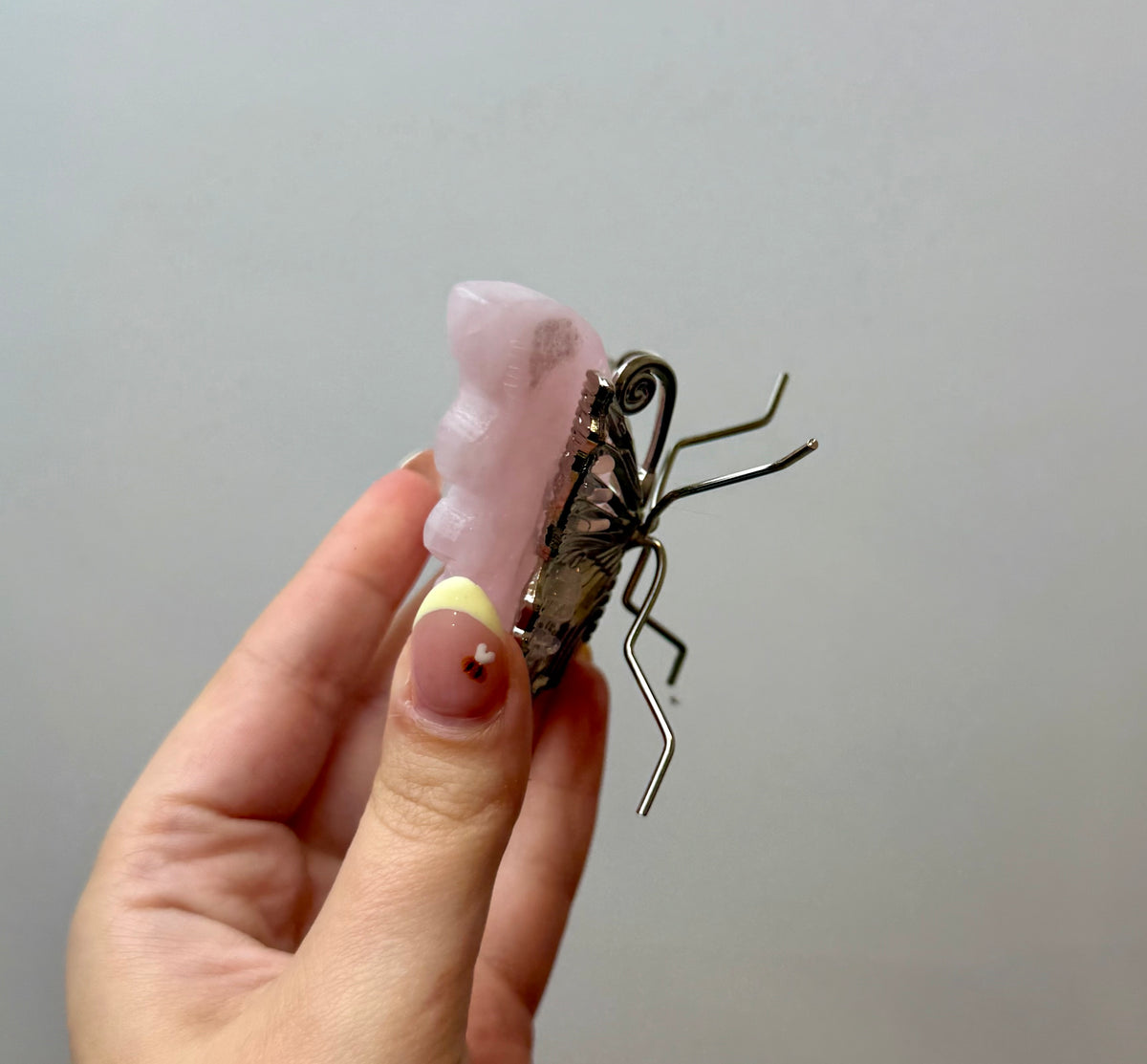 Rose quartz butterfly carving