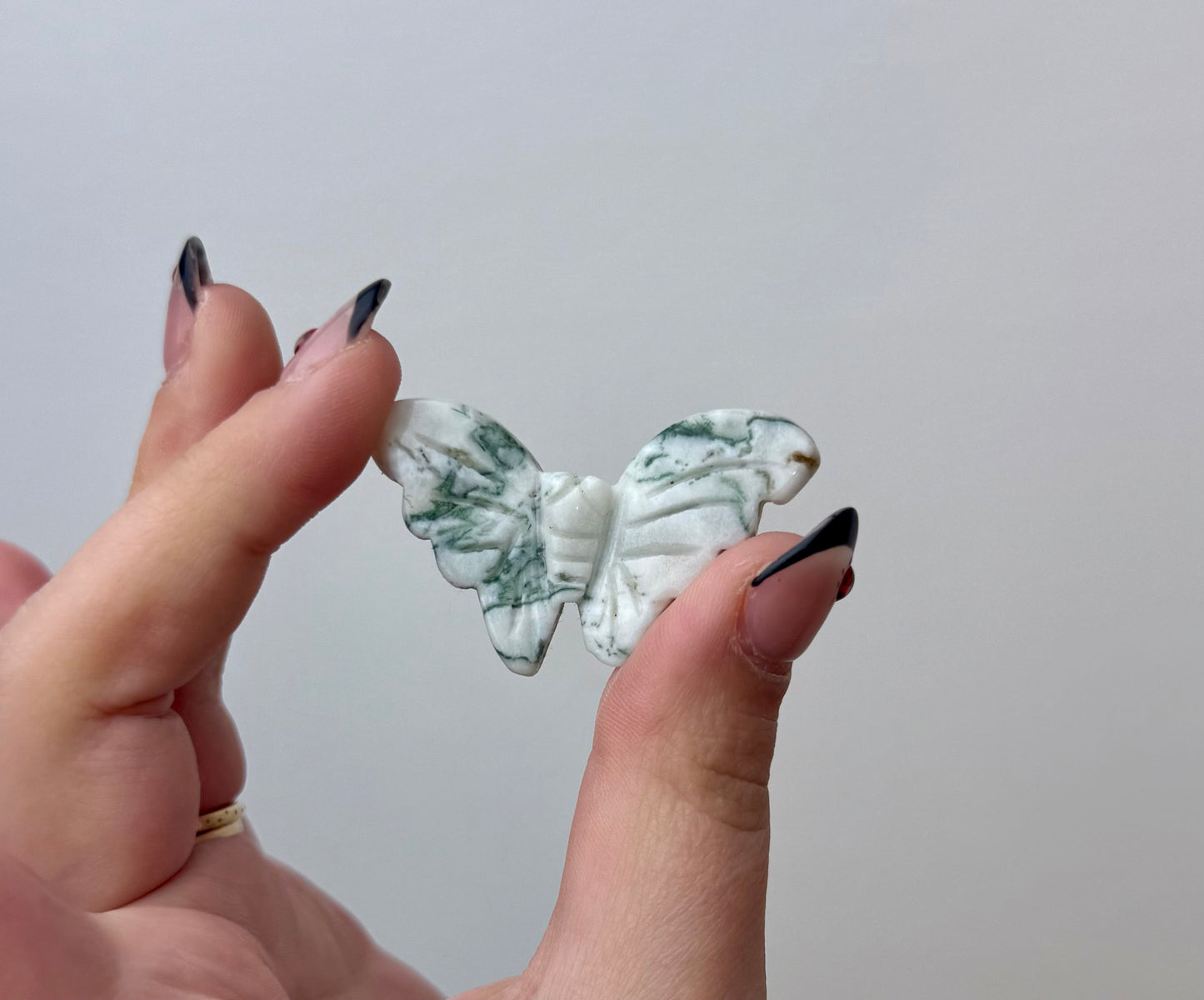 Moss agate butterfly carving