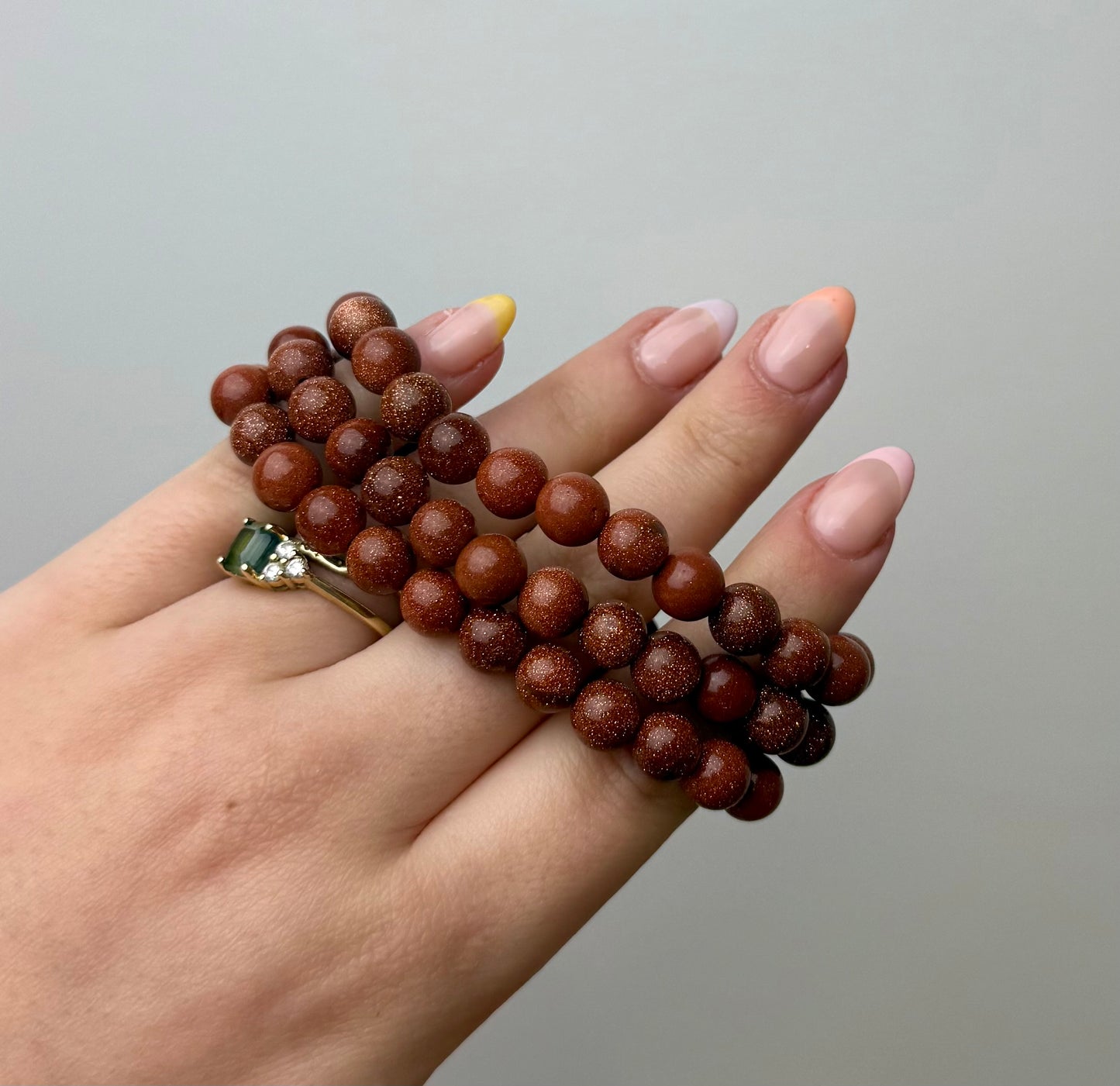 Man made material goldstone bracelets