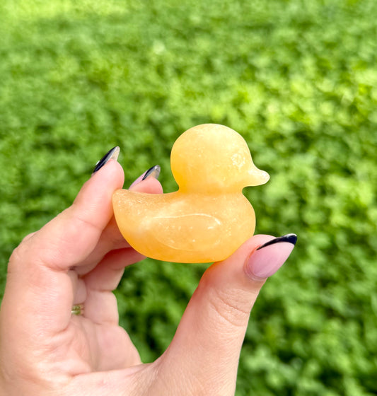 Orange calcite duck carving