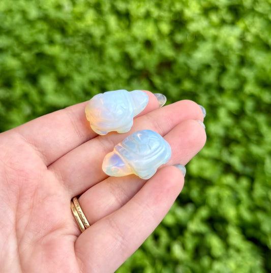 Man made material Opalite turtle carvings