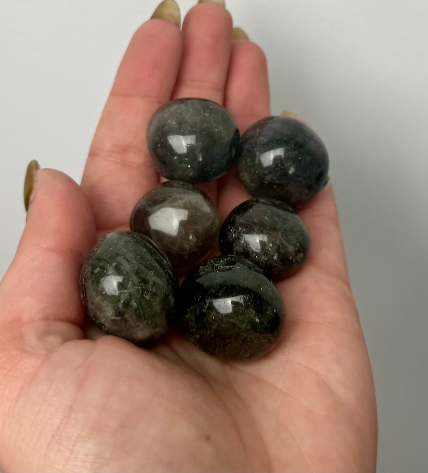 Green rutile quartz tumbles