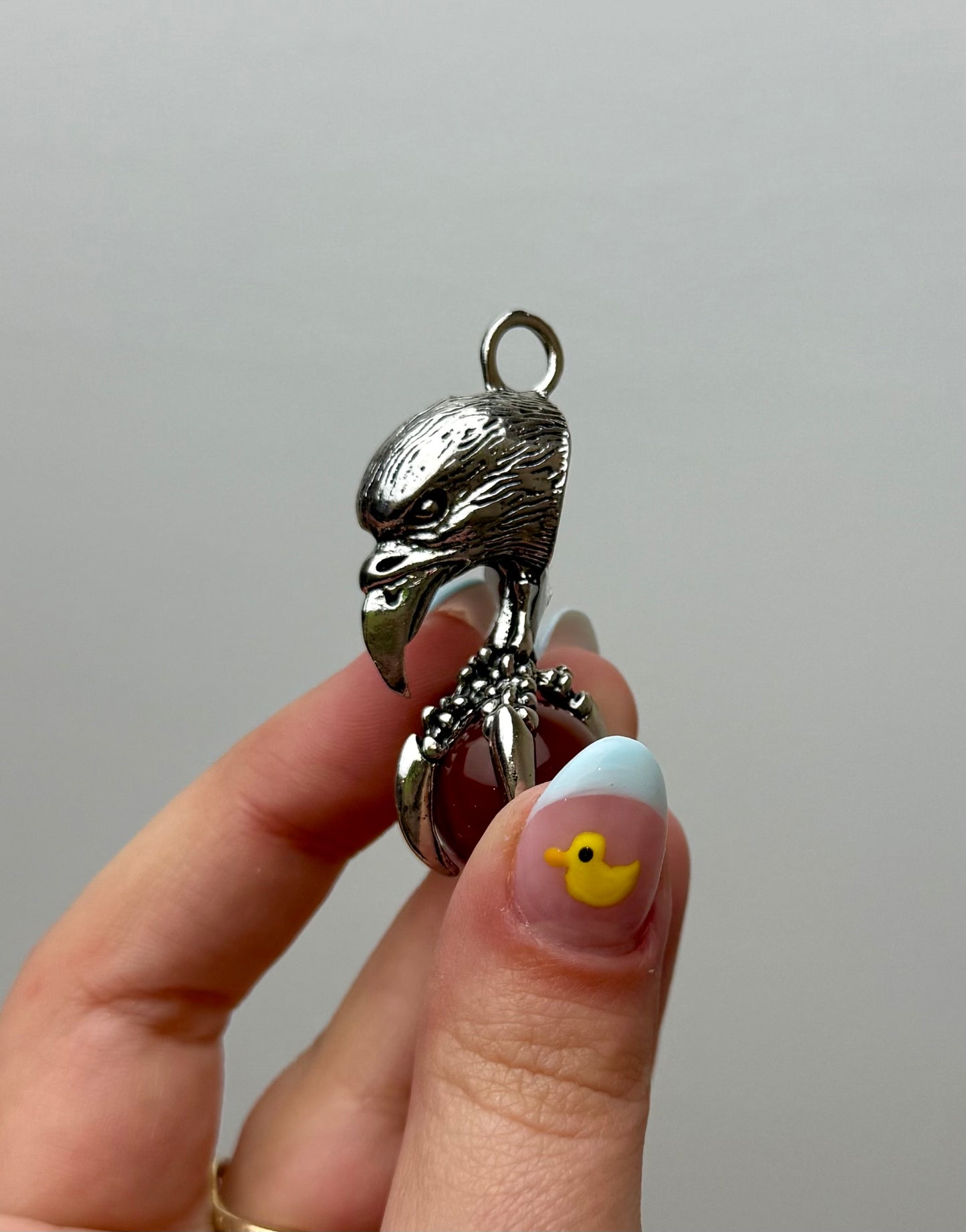 Carnelian eagle claw fidget pendant