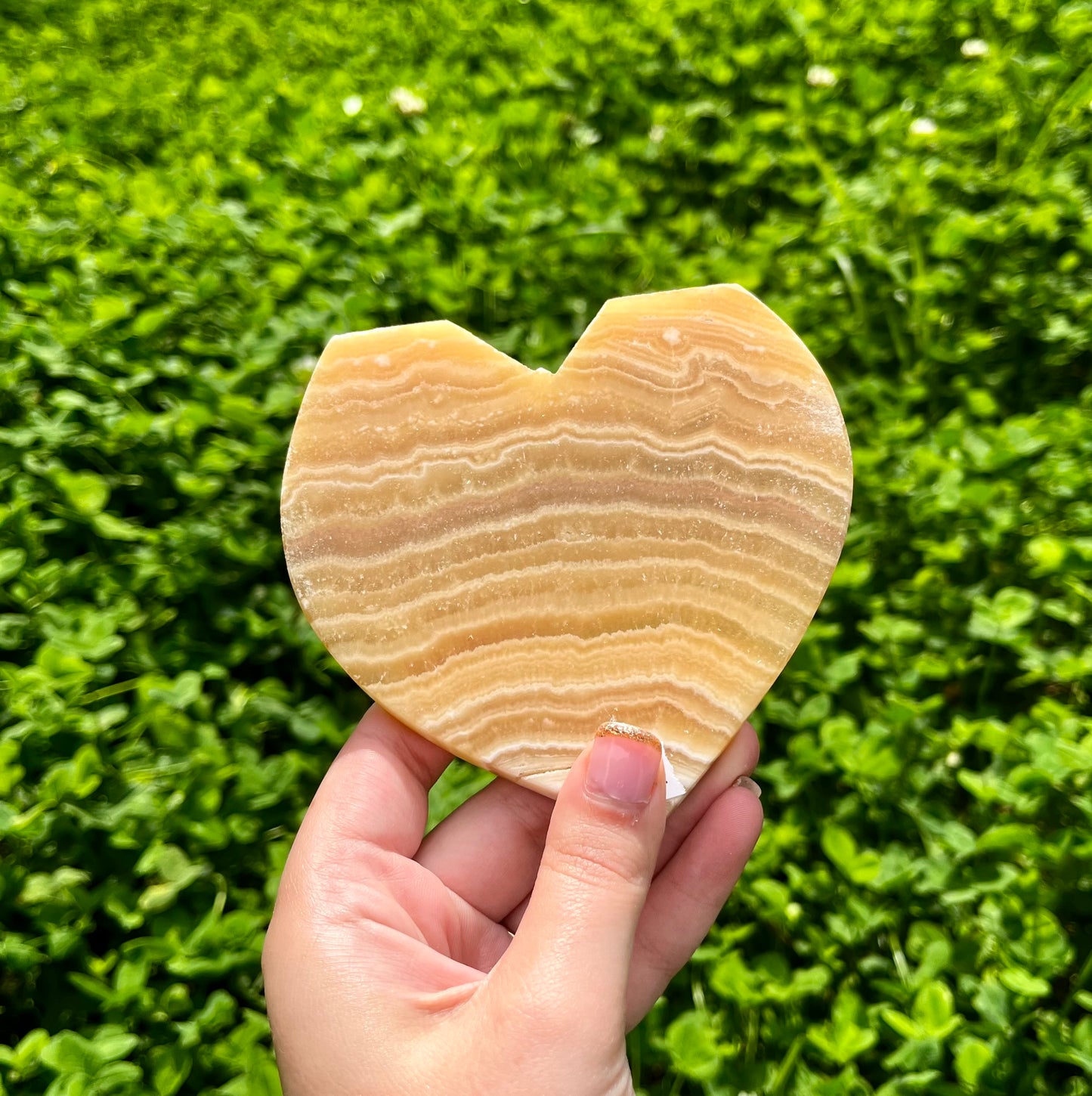 Orange calcite heart carvings