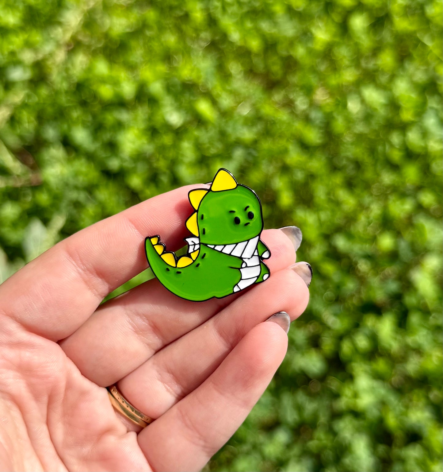 Dinosaur enamel pin