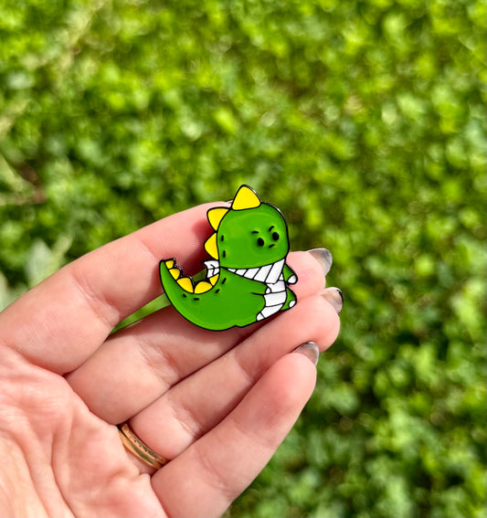 Dinosaur enamel pin