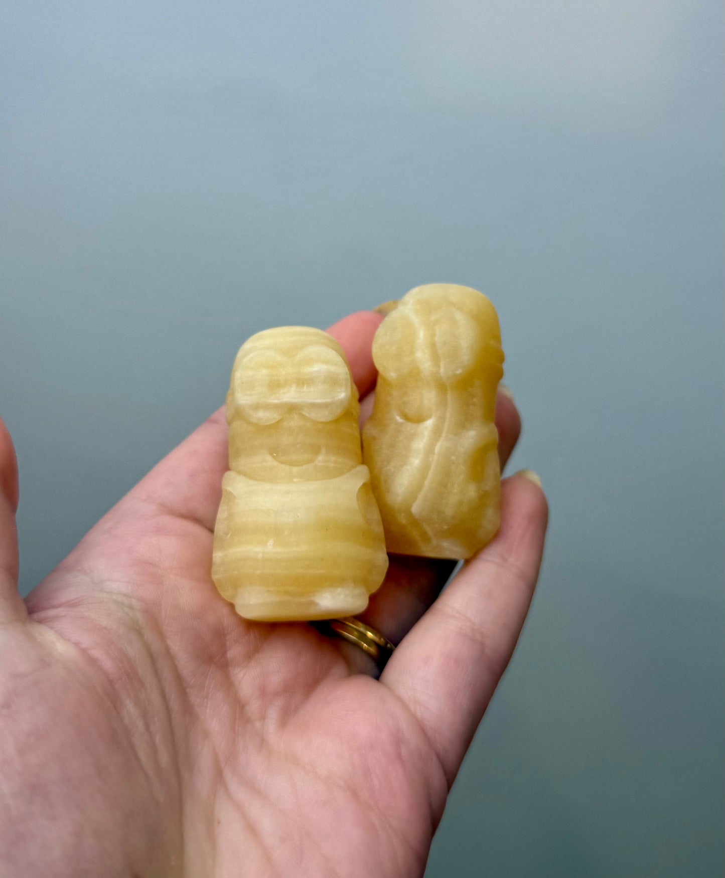 Orange calcite minion carvings