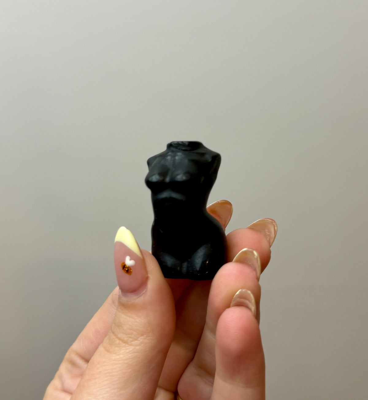 Obsidian woman body carving
