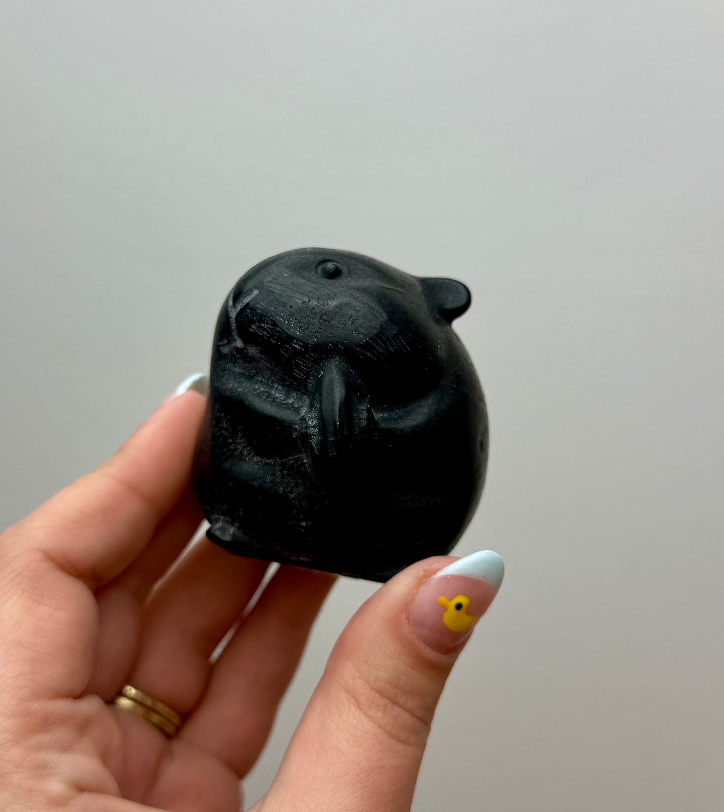 Obsidian hamster carving