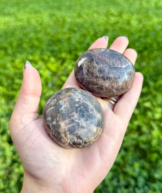 Black moonstone palm stones