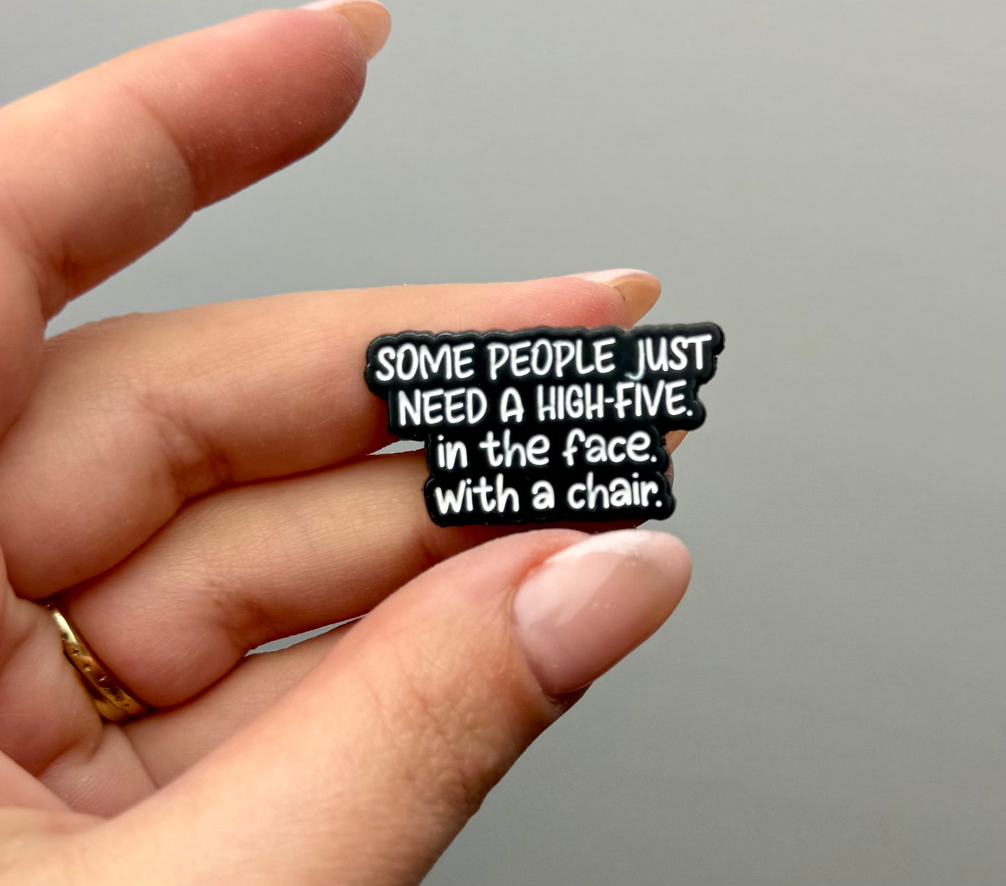 High five with a chair funny enamel pin