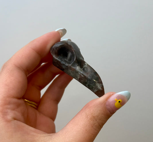Yooperlite raven skull carvings