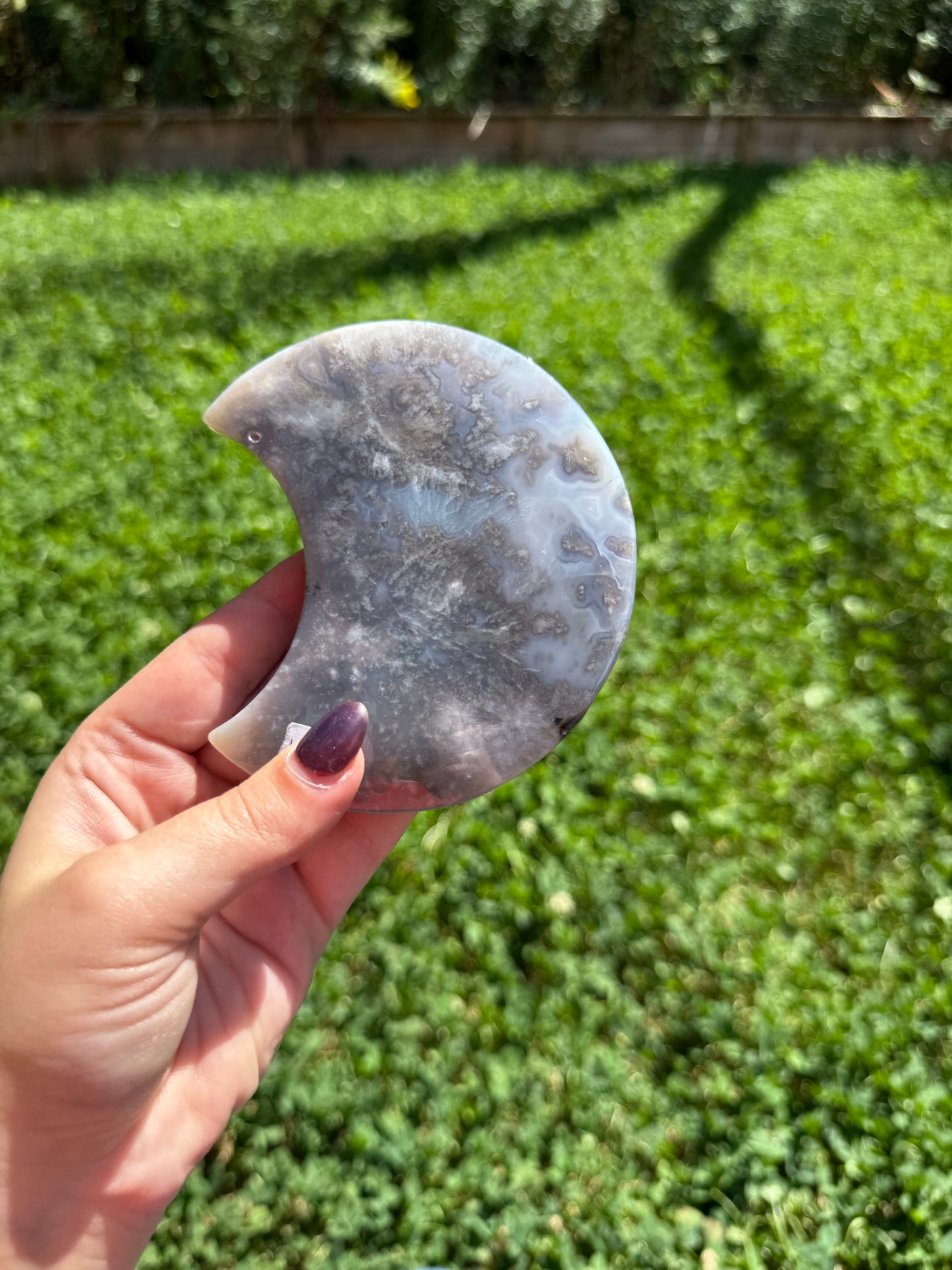 Dyed black flower agate moon carving