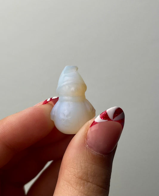 Manmade opalite snowman carving