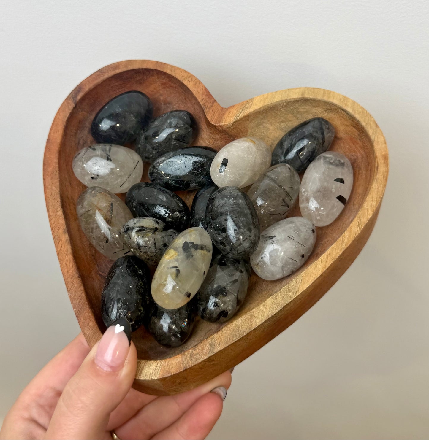 Black tourmaline in quartz tumbles