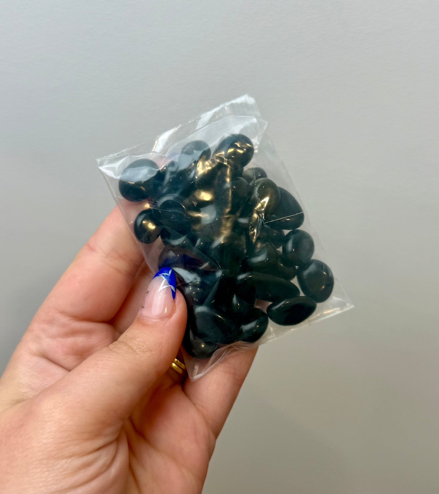 Obsidian pebble bags