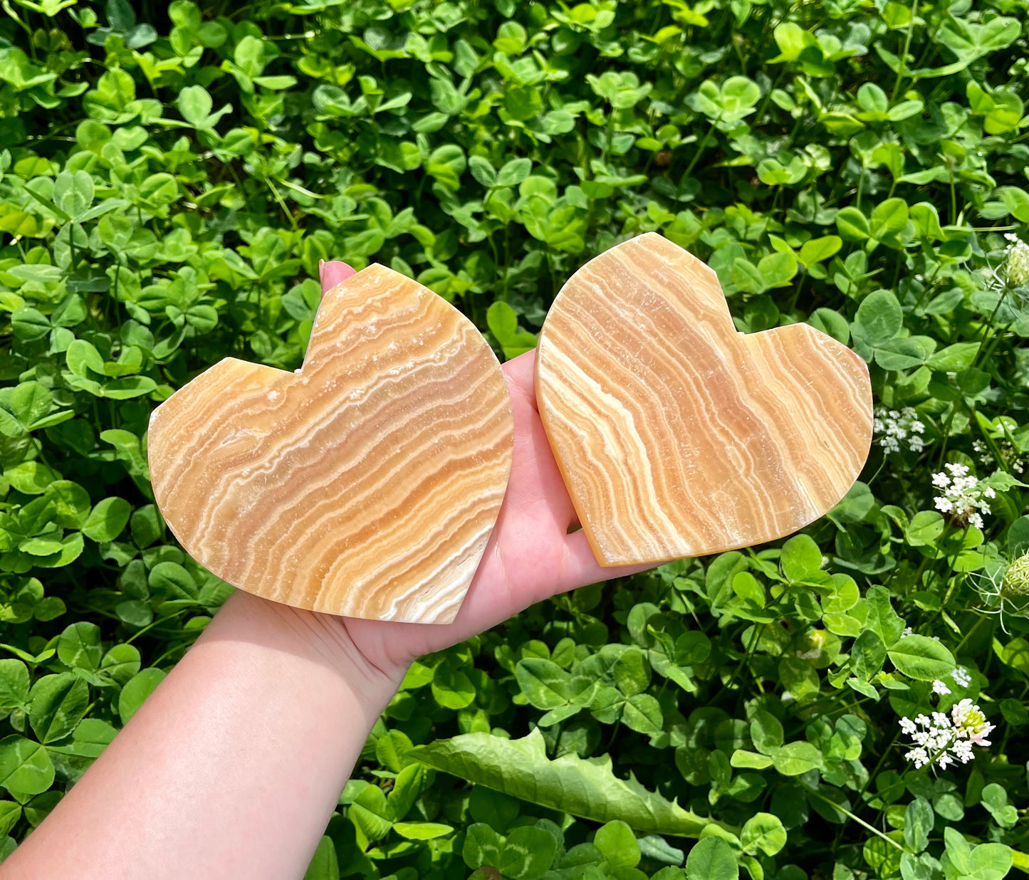 Orange calcite heart carvings