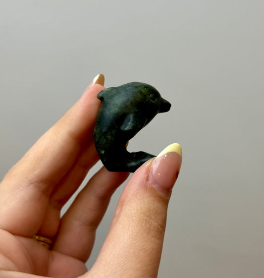 Jade dolphin carving