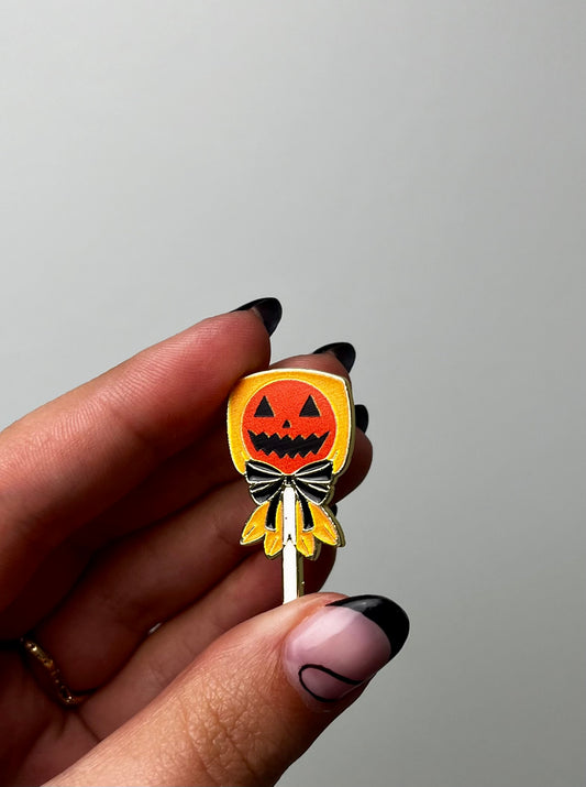 Spooky lollipop enamel pin