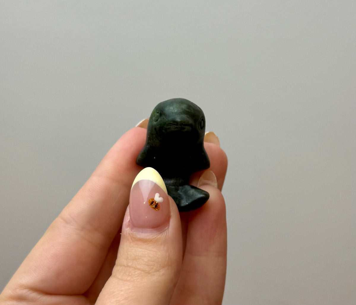 Jade dolphin carving