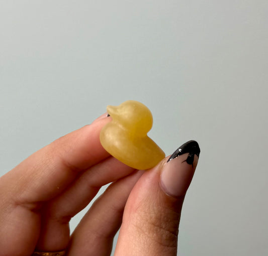 Orange calcite duck carving