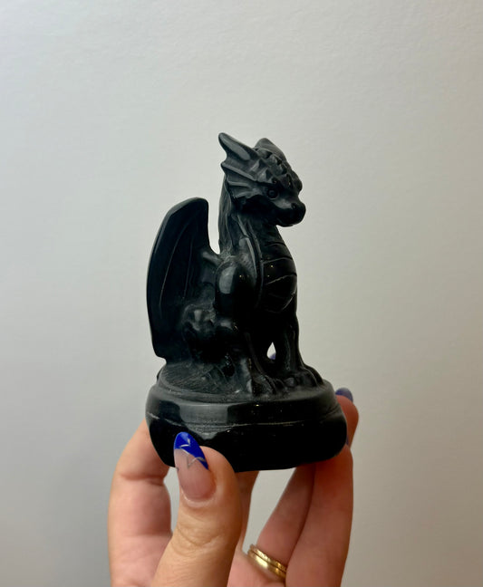 Obsidian dragon carving