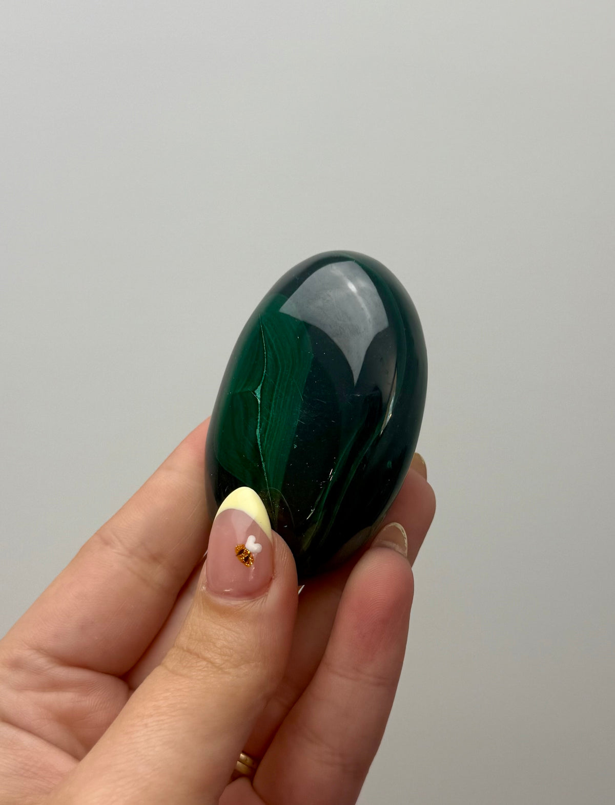 Malachite palm stone A