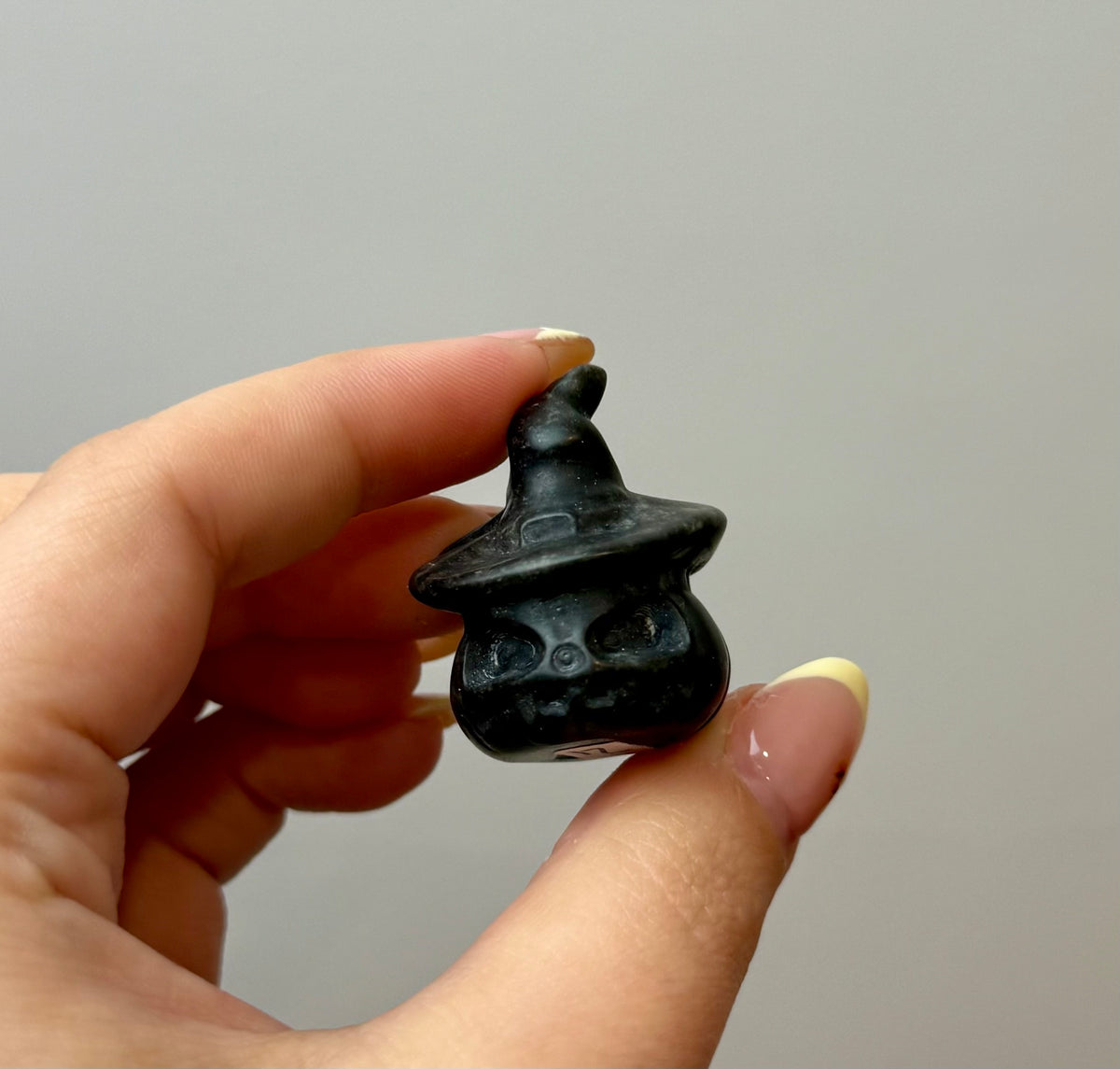 Obsidian pumpkin with witch cat carving