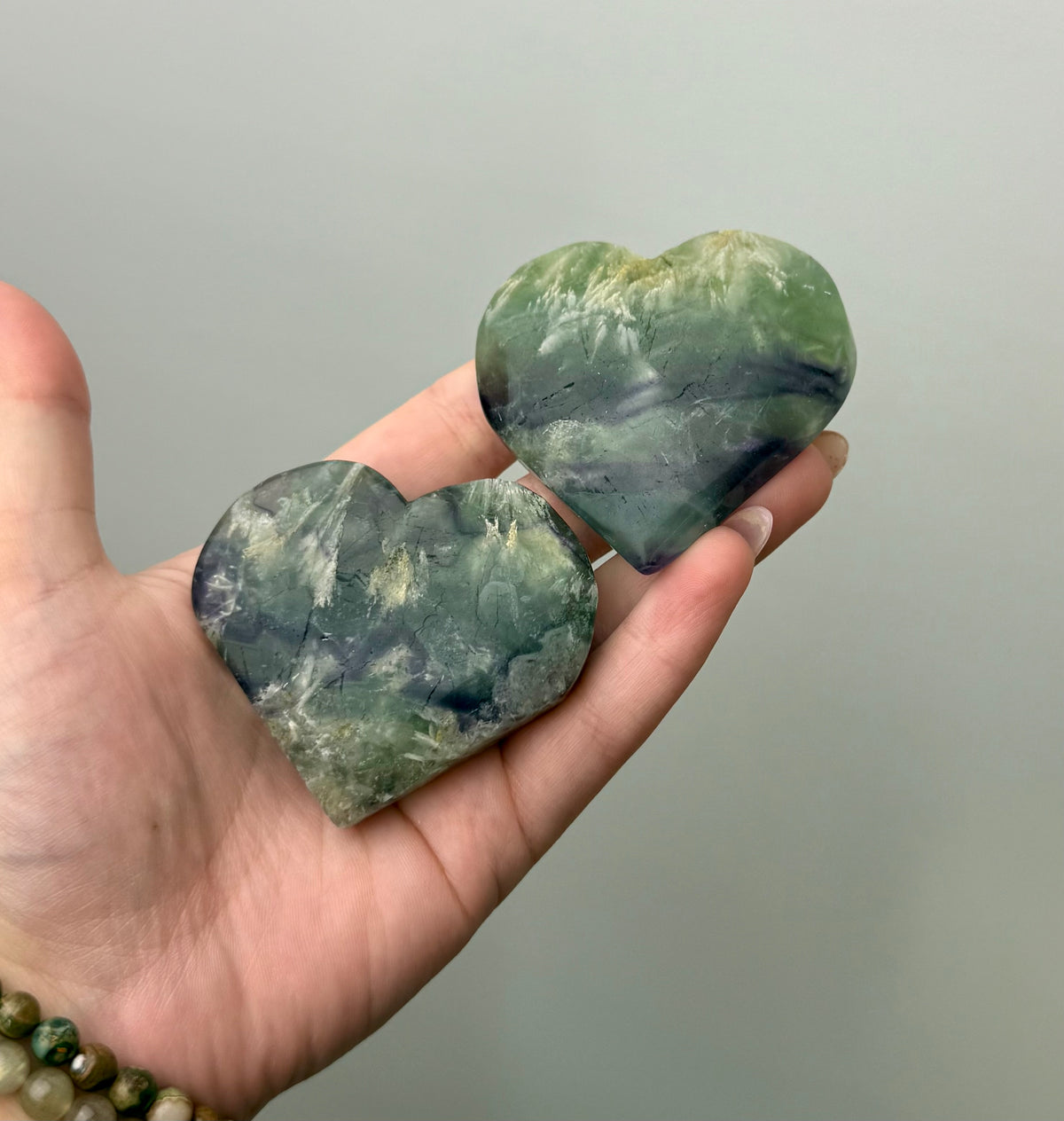 Feather fluorite heart carvings