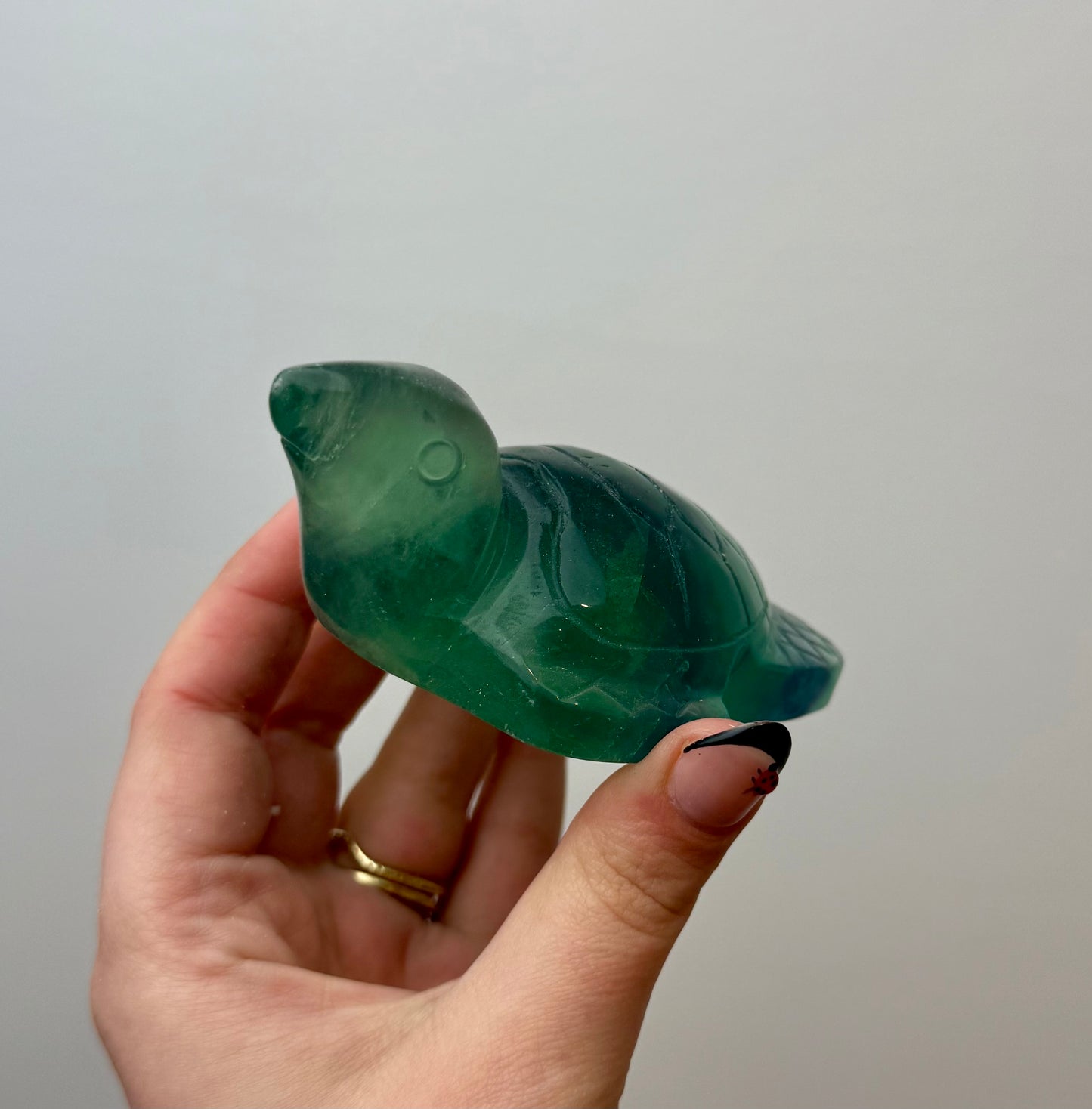 Fluorite sea turtle carving