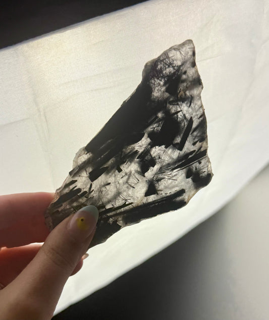 Black tourmaline in quartz slab
