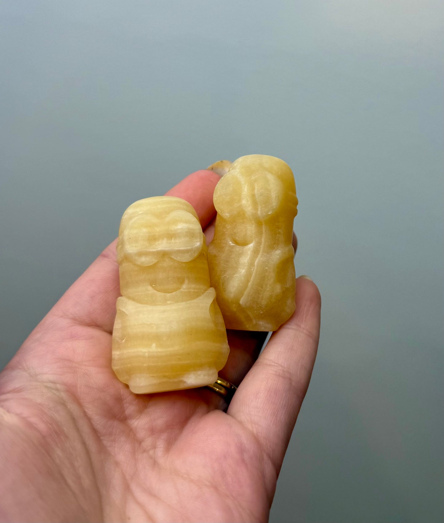 Orange calcite minion carvings