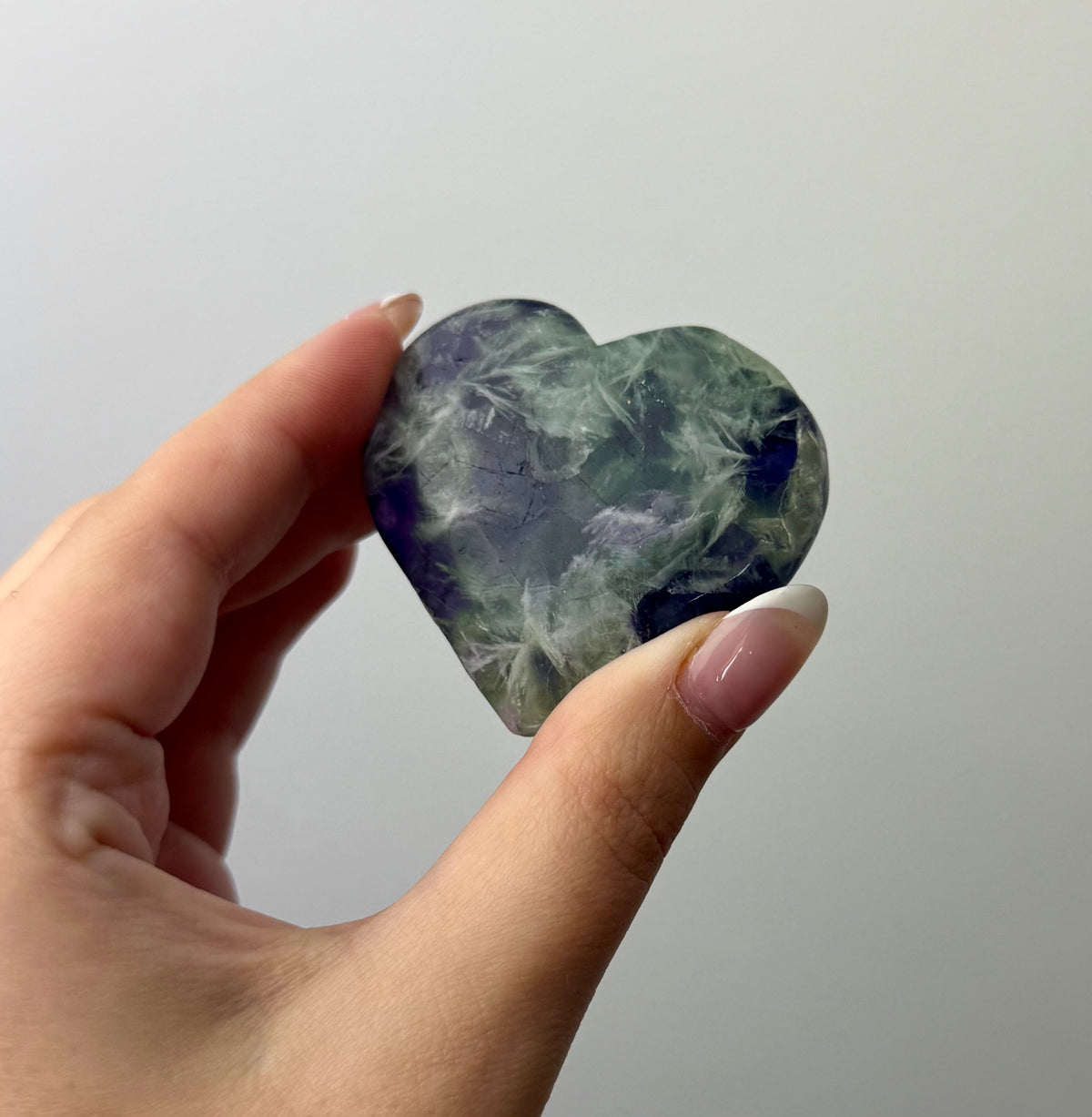 Feather fluorite heart carving