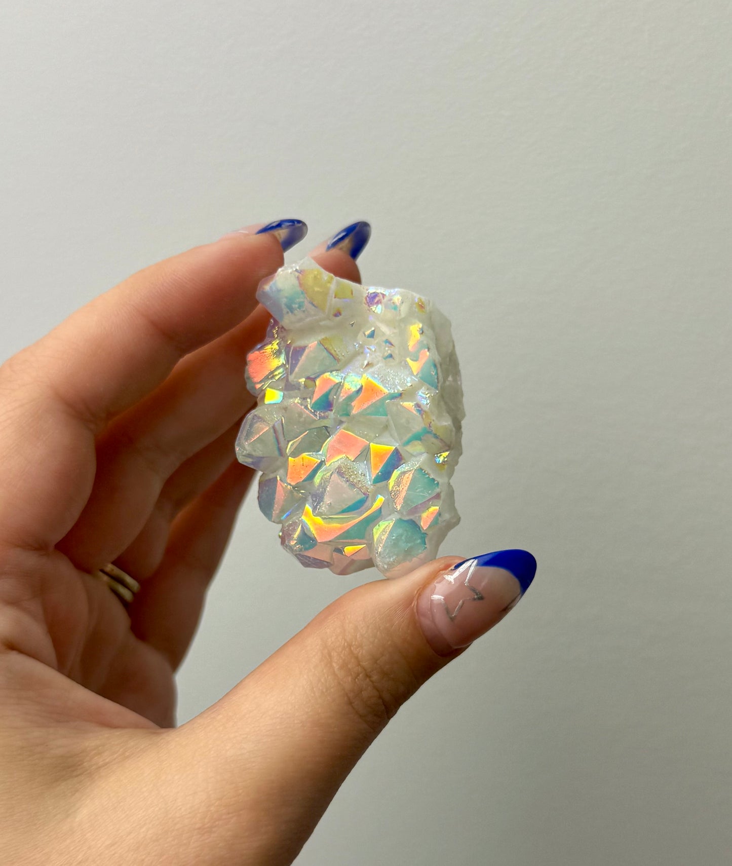 Altered aura quartz cluster