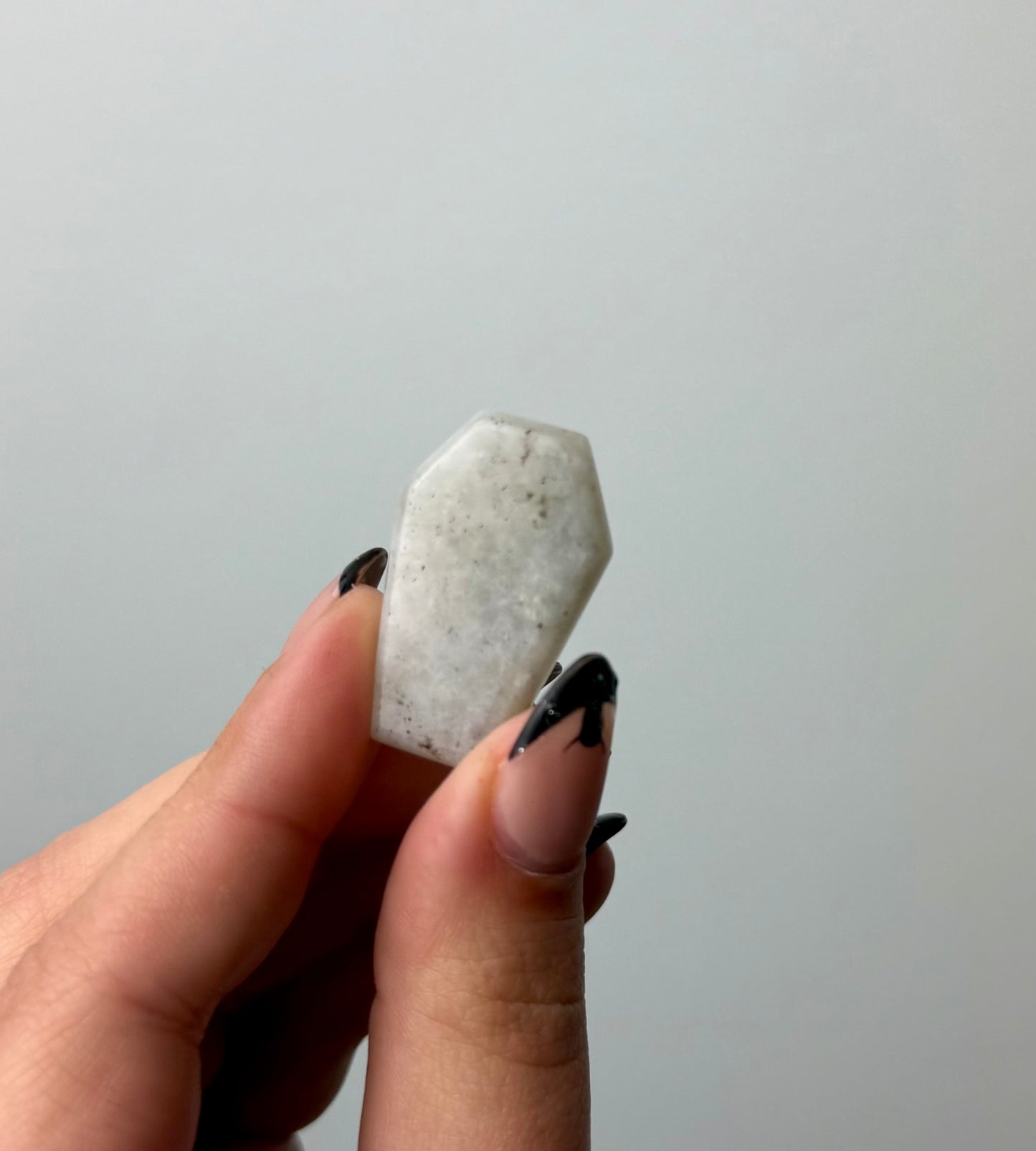 Labradorite coffin carving