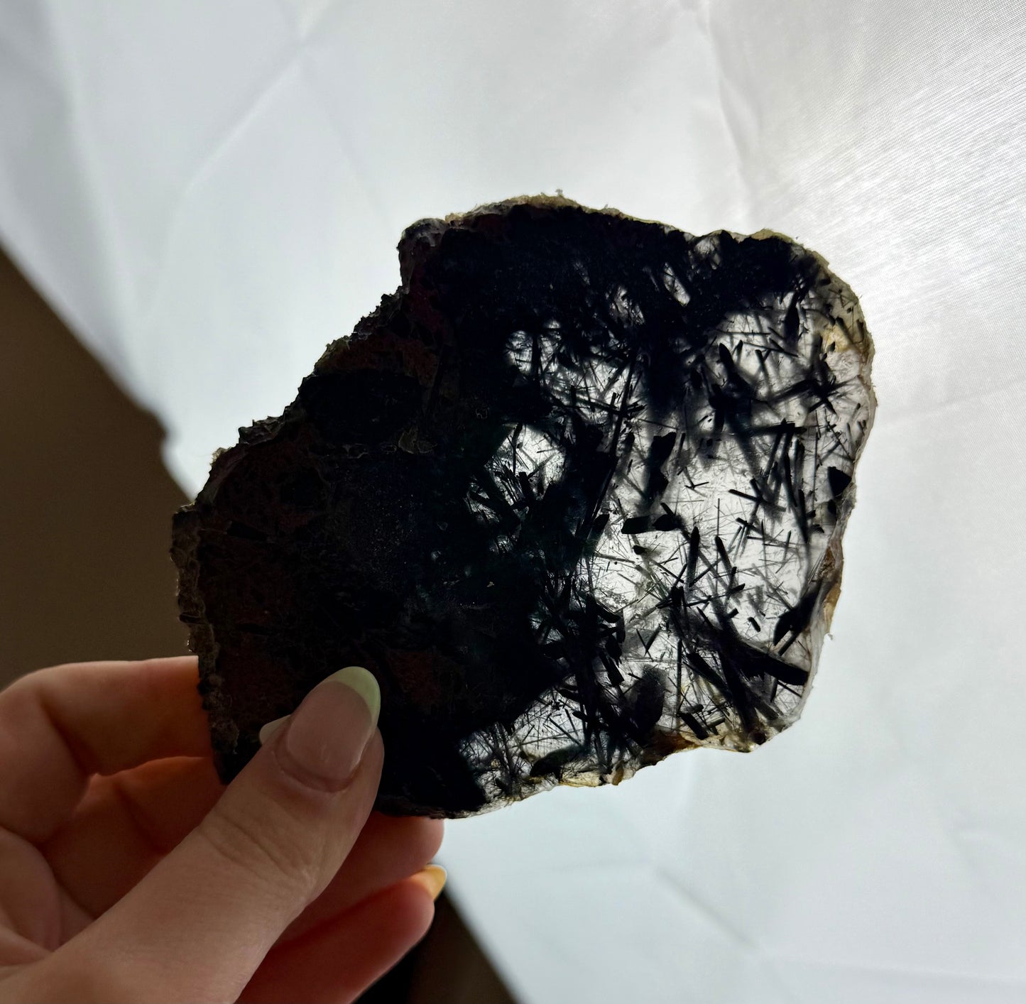 Black tourmaline in quartz slab