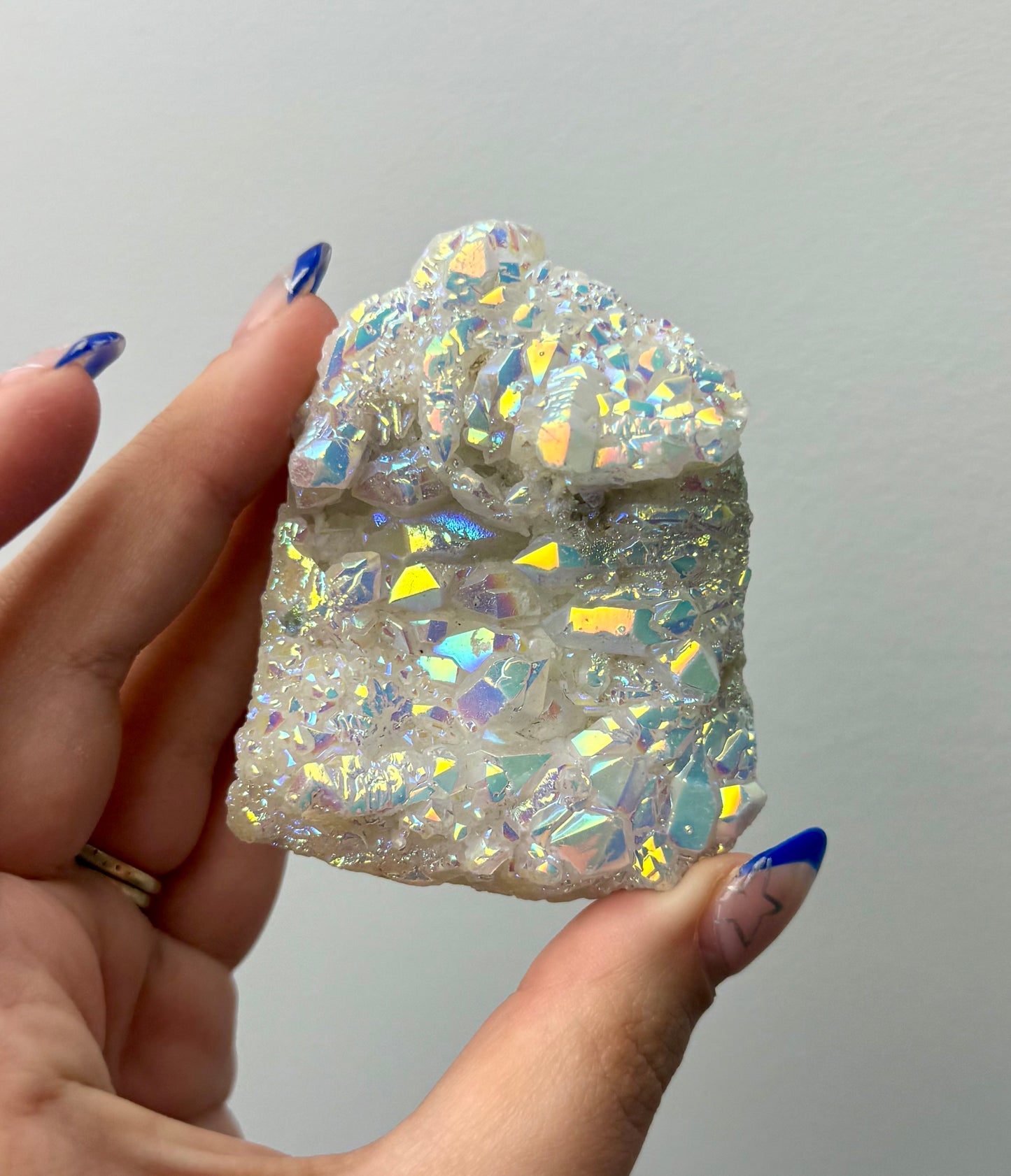 Altered aura quartz cluster