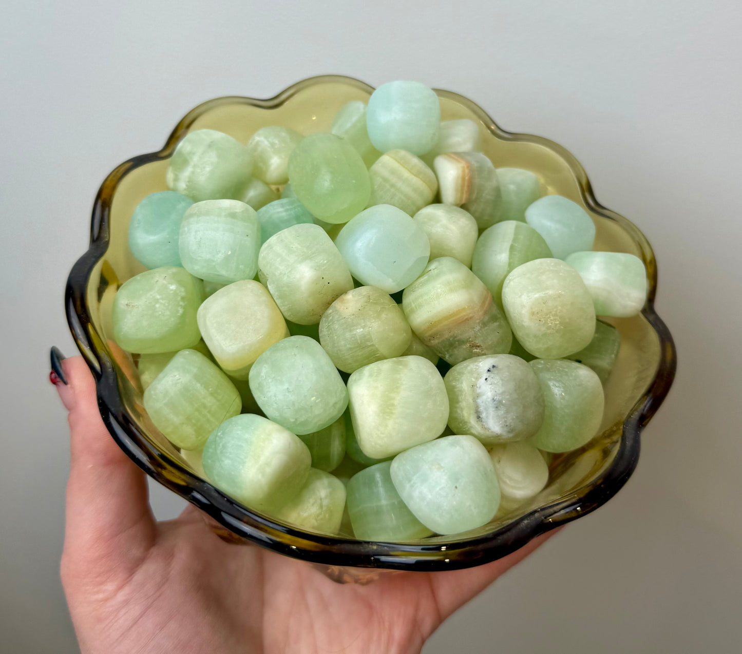 Pistachio green calcite tumbles