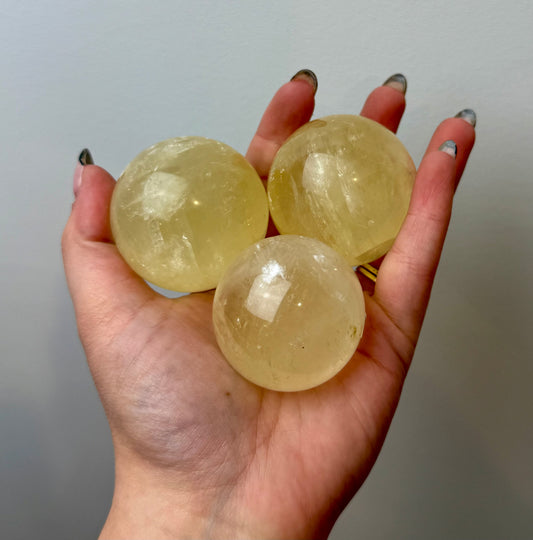 Honey calcite spheres
