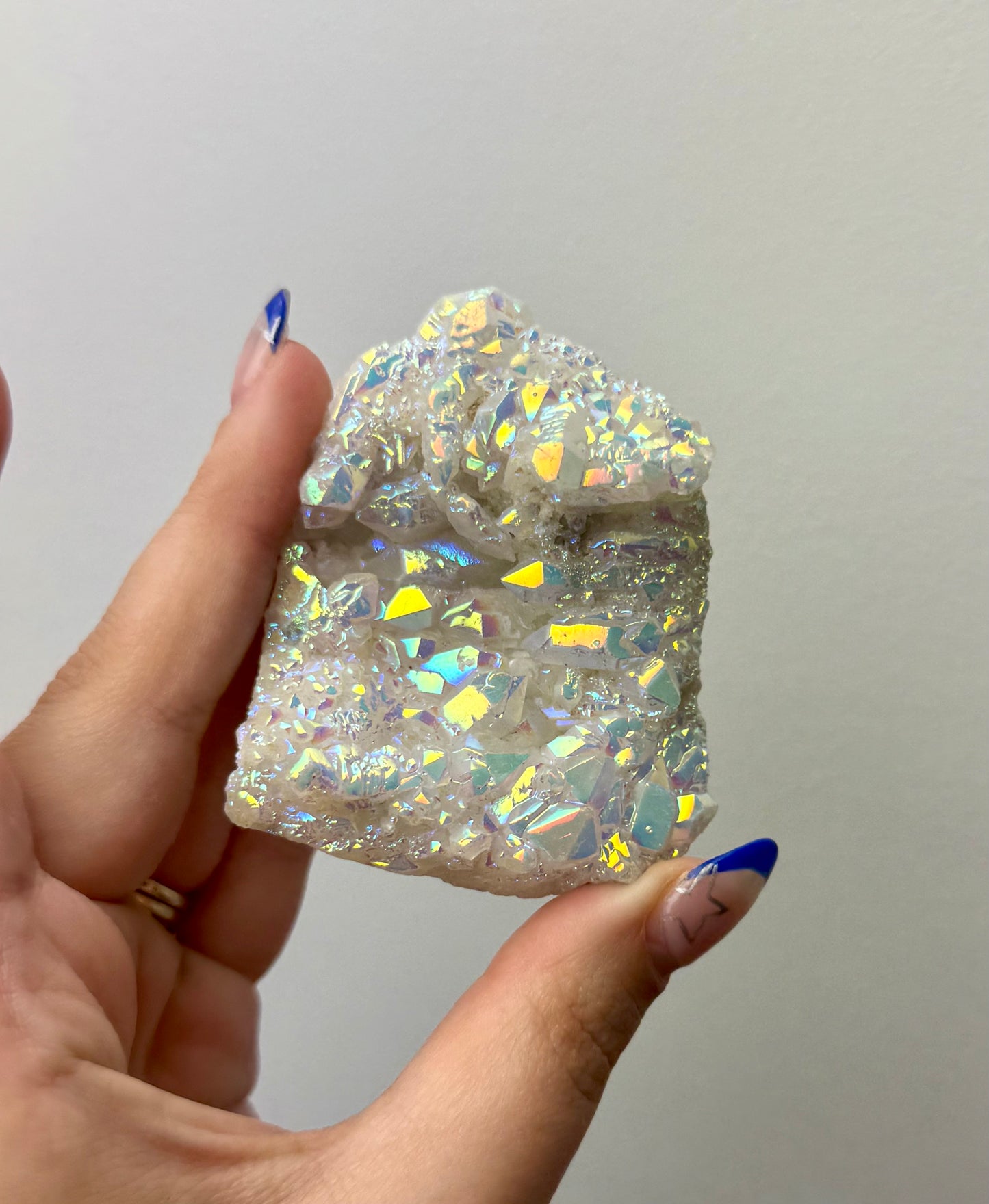Altered aura quartz cluster