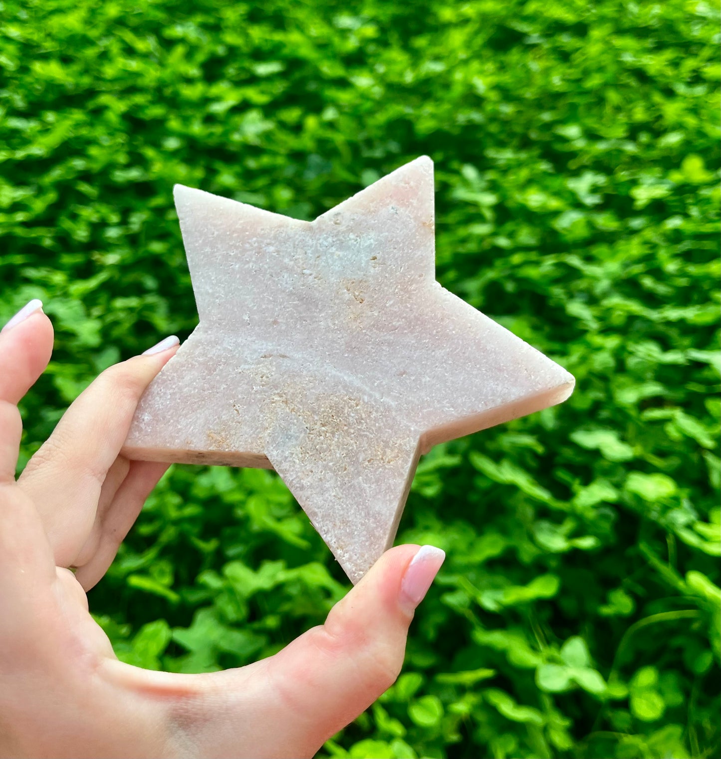 Pink amethyst star carving