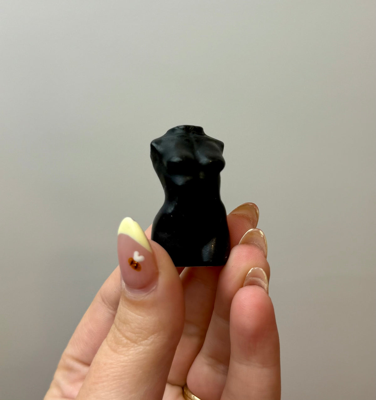 Obsidian woman body carving