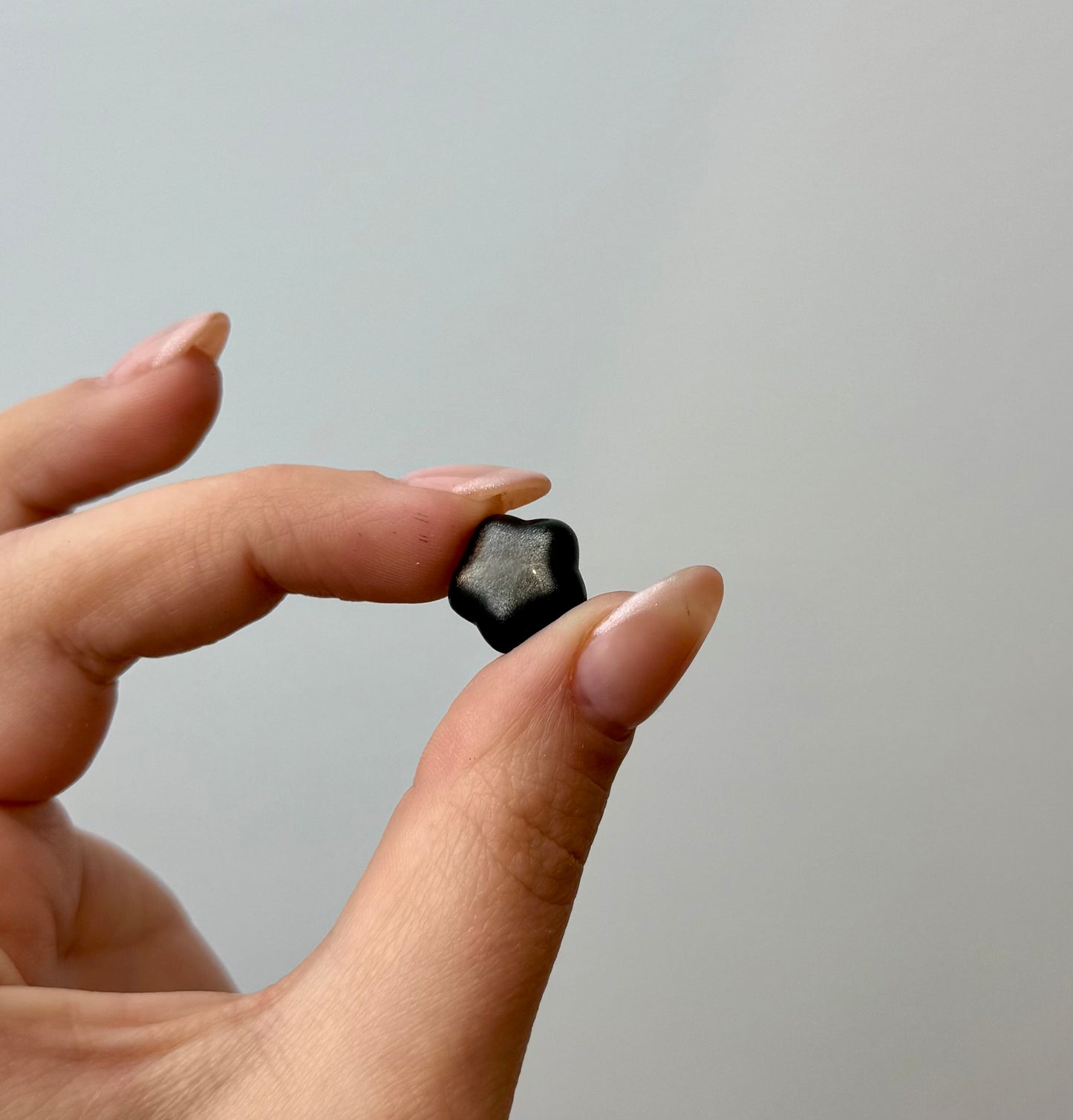Silver obsidian puffy star carvings